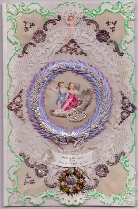 Framed Print : Cupids and flowers on a paper lace romantic card Framed Print : Cupids and flowers on a paper lace romantic card