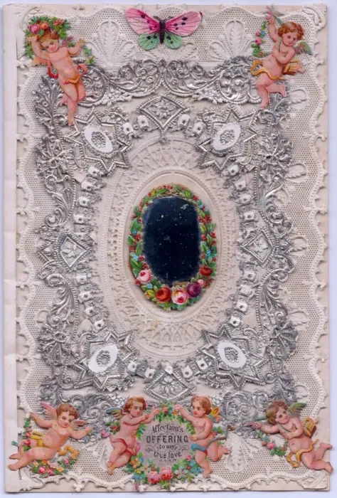 Framed Print : Cupids and flowers on a romantic paper lace card Framed Print : Cupids and flowers on a romantic paper lace card