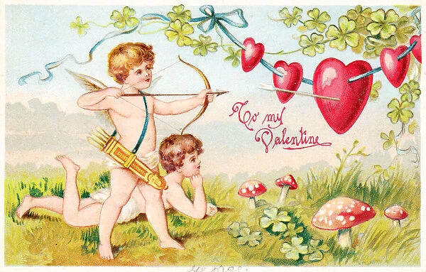 Cupids shooting arrows on a Valentine postcard