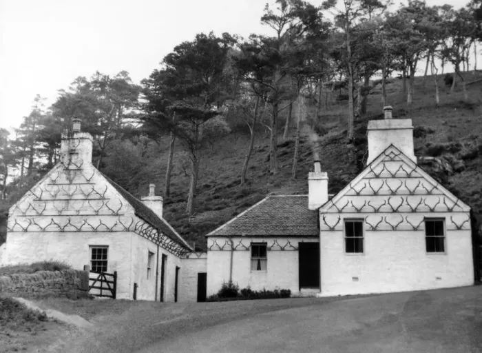 Framed Print : A curious old blacksmiths shop and cottage, decorated with dozens of deer Framed Print : A curious old blacksmiths shop and cottage, decorated with dozens of deer