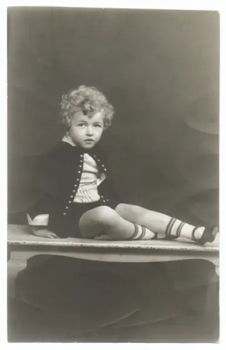 Framed Print : Curly haired boy in photographers studio Framed Print : Curly haired boy in photographers studio