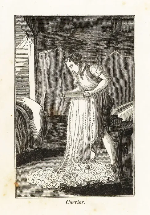 Framed Print : Currier in apron shaving an animal hide with a knife Framed Print : Currier in apron shaving an animal hide with a knife