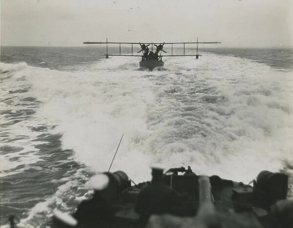 Curtiss H12 Large America on a lighter under tow at sea