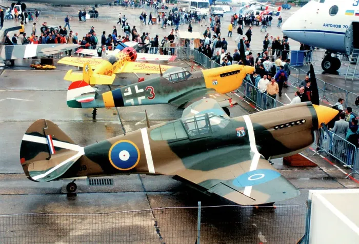 Framed Print : Curtiss P-40E Kittyhawk NZ3009 with Hispano Buchon G-BOML Framed Print : Curtiss P-40E Kittyhawk NZ3009 with Hispano Buchon G-BOML