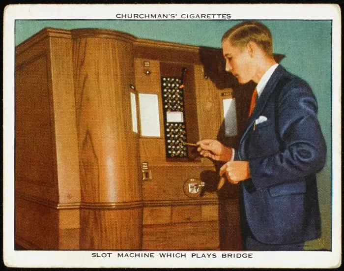 Framed Print : A customer plays an automatic bridge-playing slot machine Date: circa 1937 Framed Print : A customer plays an automatic bridge-playing slot machine Date: circa 1937