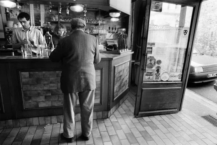 Framed Print : A customer is served in a bar in Luzarches, France Framed Print : A customer is served in a bar in Luzarches, France
