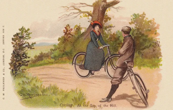 Framed Print : Cycling. Young couple cycling up a hill on a summers day Framed Print : Cycling. Young couple cycling up a hill on a summers day
