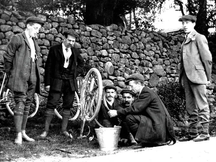 Framed Print : Cycling mending a puncture early 1900s Framed Print : Cycling mending a puncture early 1900s