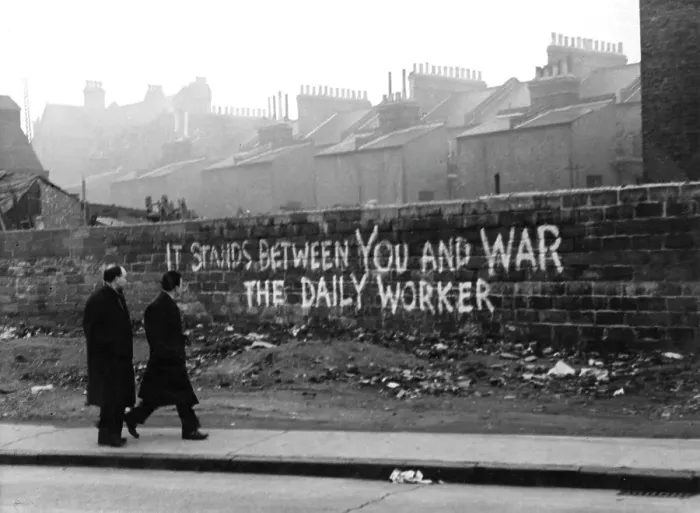 Framed Print : Daily Worker slogan on a wall Framed Print : Daily Worker slogan on a wall