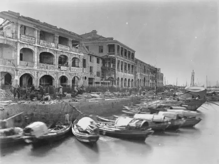 Framed Print : Damaged buildings on quayside, China Framed Print : Damaged buildings on quayside, China