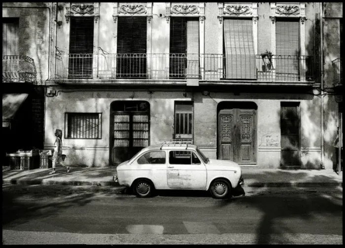 Framed Print : Dappled sunlight pedestrian and car, Valencia, Spain Framed Print : Dappled sunlight pedestrian and car, Valencia, Spain
