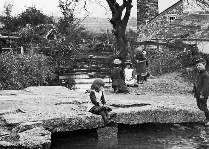Framed Print : Dartmoor Children playing on stone bridge early 1900s Framed Print : Dartmoor Children playing on stone bridge early 1900s