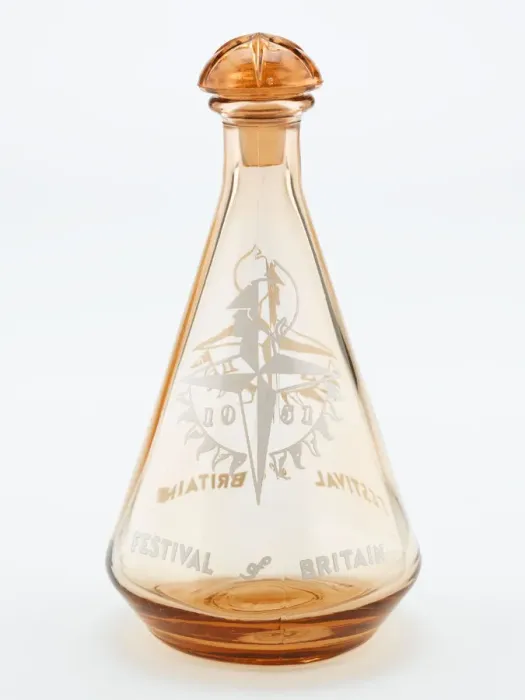 Framed Print : Decanter. Tangerine coloured glass decanter of conical form Framed Print : Decanter. Tangerine coloured glass decanter of conical form