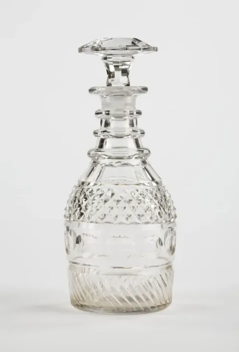 Framed Print : Decanter. Half-size decanter with rings around the neck Framed Print : Decanter. Half-size decanter with rings around the neck