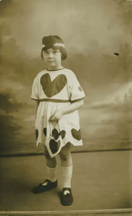 Framed Print : Delightful photograph of a little girl called Margaret dressed in a costume embellished with love hearts. Date: 1926 Framed Print : Delightful photograph of a little girl called Margaret dressed in a costume embellished with love hearts. Date: 1926