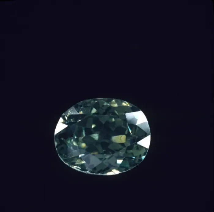 Framed Print : Demantoid garnet cut stone Framed Print : Demantoid garnet cut stone