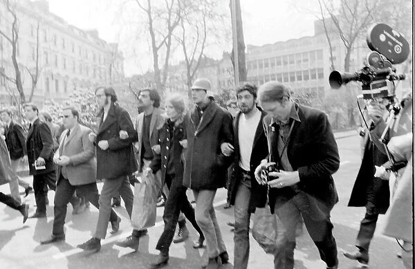 Demonstration in London -- Tariq Ali (b. 1943, centre), writer, journalist and filmmaker