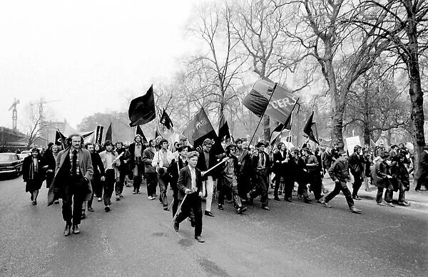 Demonstration in London -- young protesters walking purposefully along a road