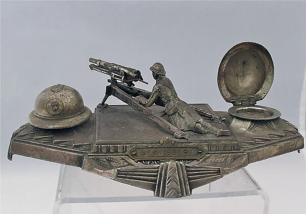 Die-cast desk ornament of a French machine-gunner
