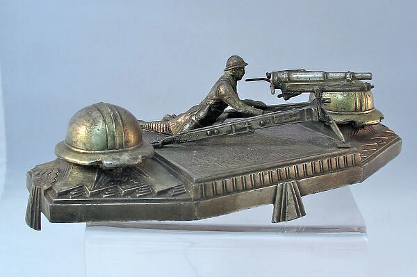 Die-cast desk ornament of a French machine-gunner