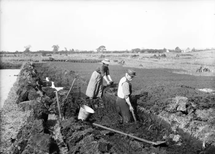 Framed Print : Digging Mud Turf in an Oul Bog Hole Co. Antrim