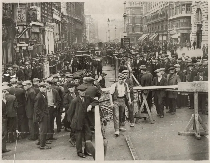 Framed Print : Disruption in Piccadilly, London, with crowds of people watching work being done on part Framed Print : Disruption in Piccadilly, London, with crowds of people watching work being done on part