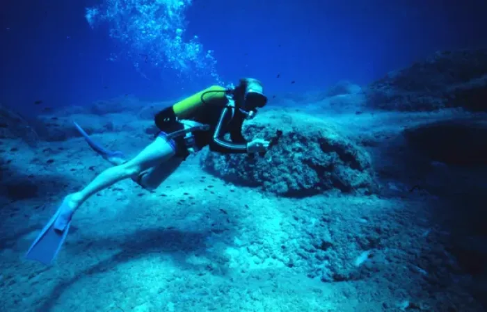 Framed Print : Diver on the seabed off the coast of Malta