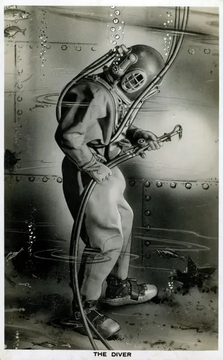 Framed Print : Diver working on the hull of a ship underwater Framed Print : Diver working on the hull of a ship underwater