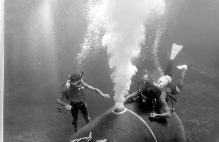 Framed Print : Divers with underwater house off the coast of Malta