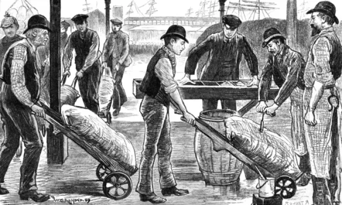 Framed Print : Dockers unload sugar at the West India Docks, London Framed Print : Dockers unload sugar at the West India Docks, London