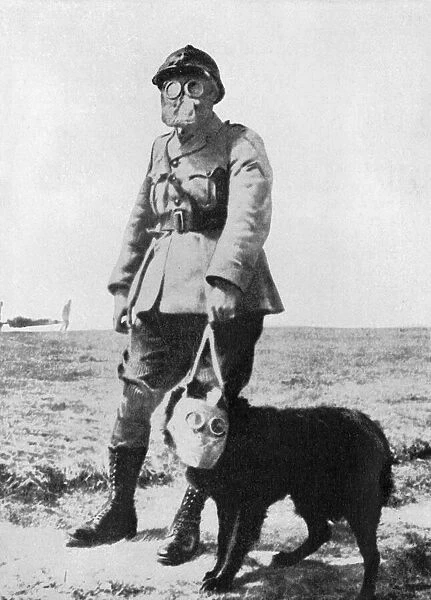 Dog and Handler wearing gas masks at the battle front