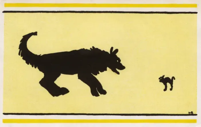 Framed Print : A Dog and a tiny kitten square off against each other Framed Print : A Dog and a tiny kitten square off against each other