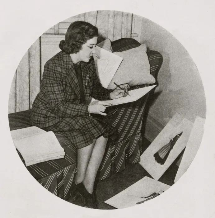 Framed Print : Dolly Tree at MGM in her studio surrounded by her sketches Framed Print : Dolly Tree at MGM in her studio surrounded by her sketches