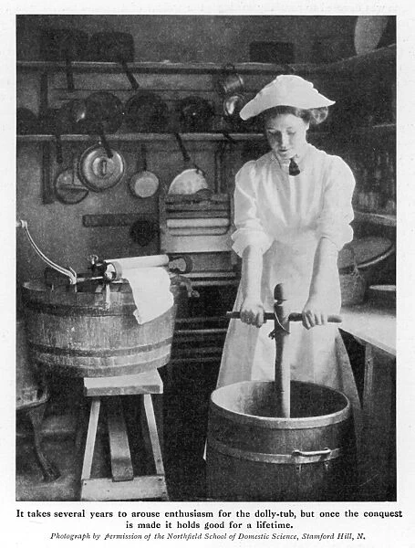 DOLLY TUB. A laundry worker using a dolly stock