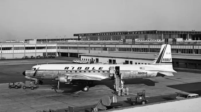 Framed Print : Douglas DC-7CF of Riddles N8215H at Idlewild, later JF Framed Print : Douglas DC-7CF of Riddles N8215H at Idlewild, later JF
