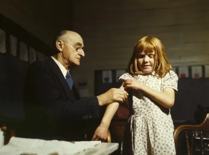 Framed Print : Dr. Schreiber of San Augustine giving a typhoid innoculation Framed Print : Dr. Schreiber of San Augustine giving a typhoid innoculation