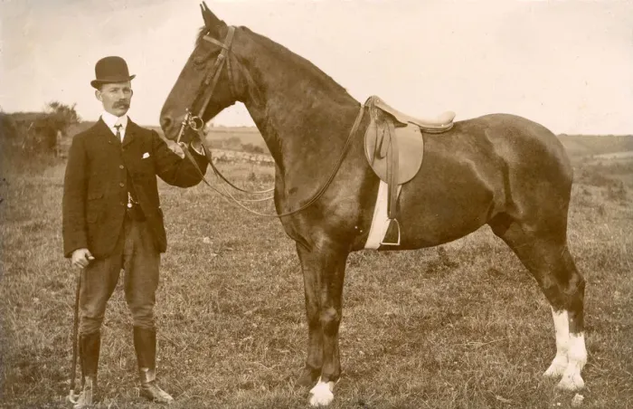 Framed Print : Well dressed man with saddled horse Framed Print : Well dressed man with saddled horse