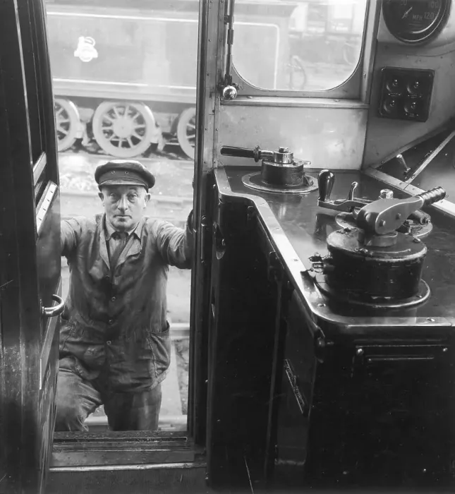 Framed Print : A Driver Climbing in to his Cab Framed Print : A Driver Climbing in to his Cab