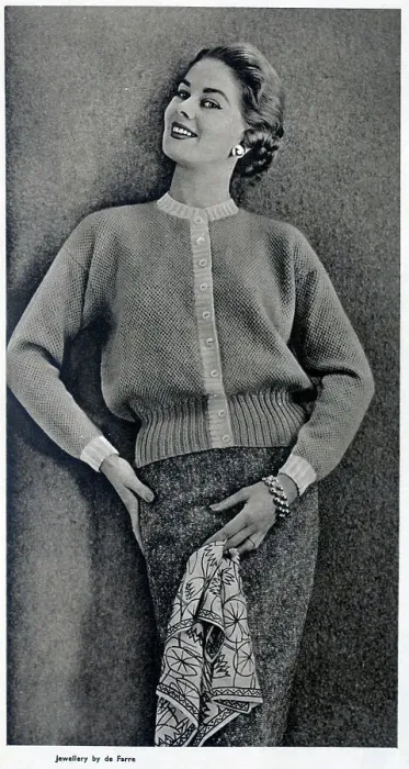 Framed Print : A drop shoulder cardigan in honeycomb stitch, published with instructions on how to create the garment at home. Date: 1954 Framed Print : A drop shoulder cardigan in honeycomb stitch, published with instructions on how to create the garment at home. Date: 1954