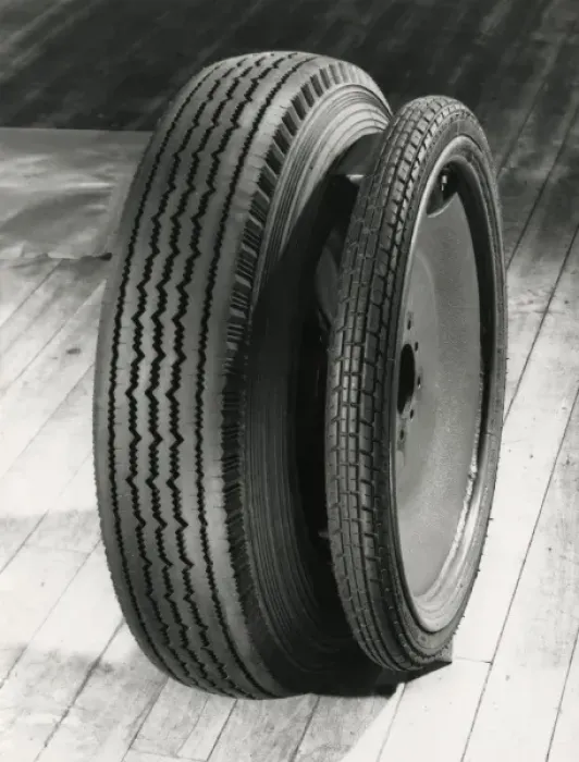 Framed Print : Dunlop spare wheel compared with standard Framed Print : Dunlop spare wheel compared with standard