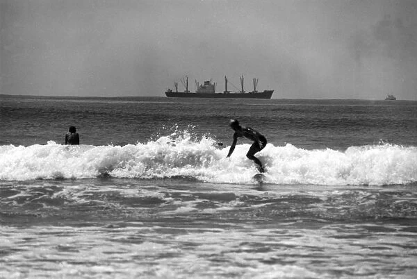 Durban Surfers. Surfing at Durban, South Africa. Date: late 1960s