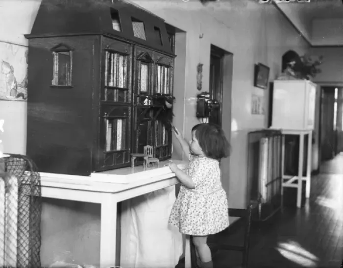 Framed Print : Dusting a Dolls House Framed Print : Dusting a Dolls House