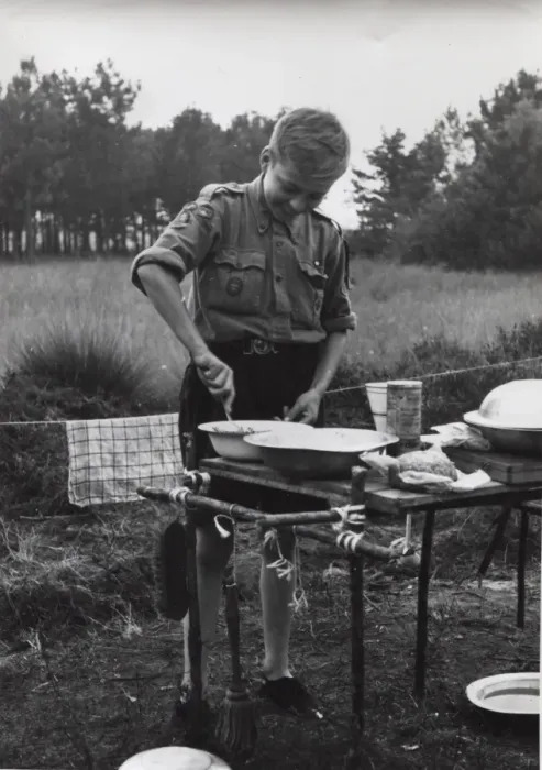 Framed Print : Dutch boy scout cooking at camp, Holland Framed Print : Dutch boy scout cooking at camp, Holland