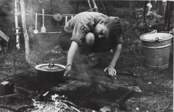 Framed Print : Dutch boy scout cooking at camp, Holland Framed Print : Dutch boy scout cooking at camp, Holland