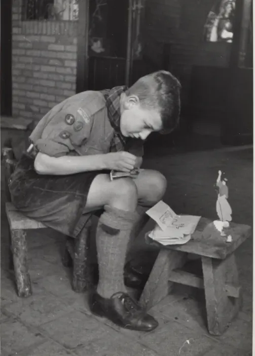 Framed Print : Dutch boy scout making model animal, Holland Framed Print : Dutch boy scout making model animal, Holland