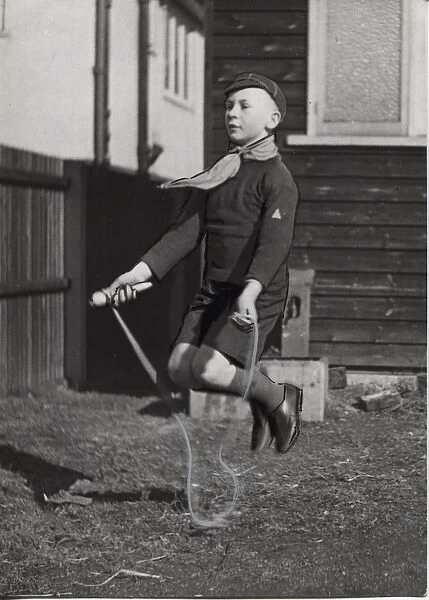 Dutch cub scout skipping with a rope, Netherlands