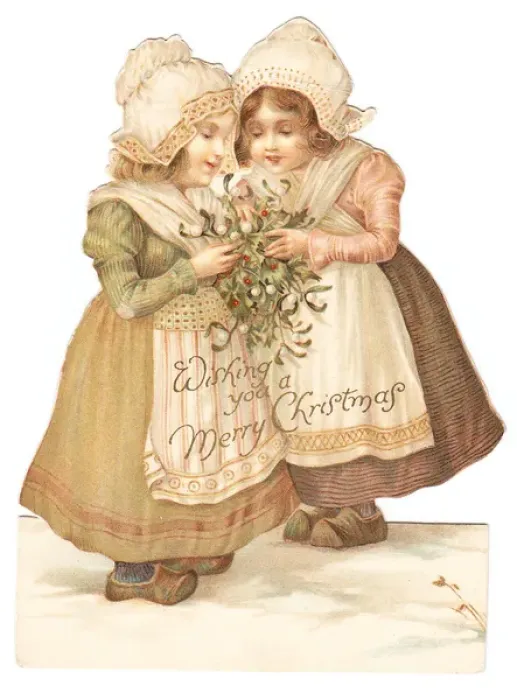 Framed Print : Two Dutch girls on a cutout Christmas card Framed Print : Two Dutch girls on a cutout Christmas card