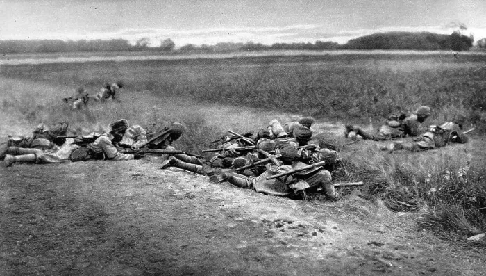 Framed Print : On duty with the allies in France: Indian Infantry taking cover while attacking Framed Print : On duty with the allies in France: Indian Infantry taking cover while attacking