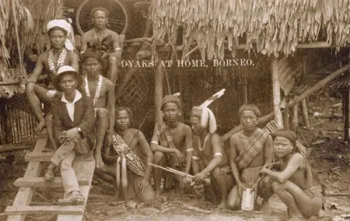 Framed Print : Dyak people outside their house, Borneo Framed Print : Dyak people outside their house, Borneo