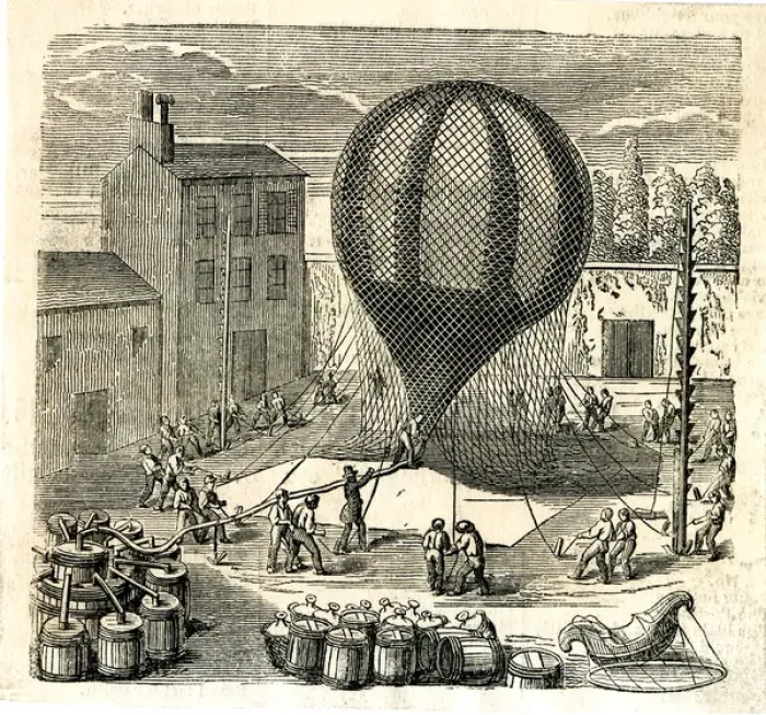 Framed Print : Early Ballooning - Inflating a balloon Framed Print : Early Ballooning - Inflating a balloon